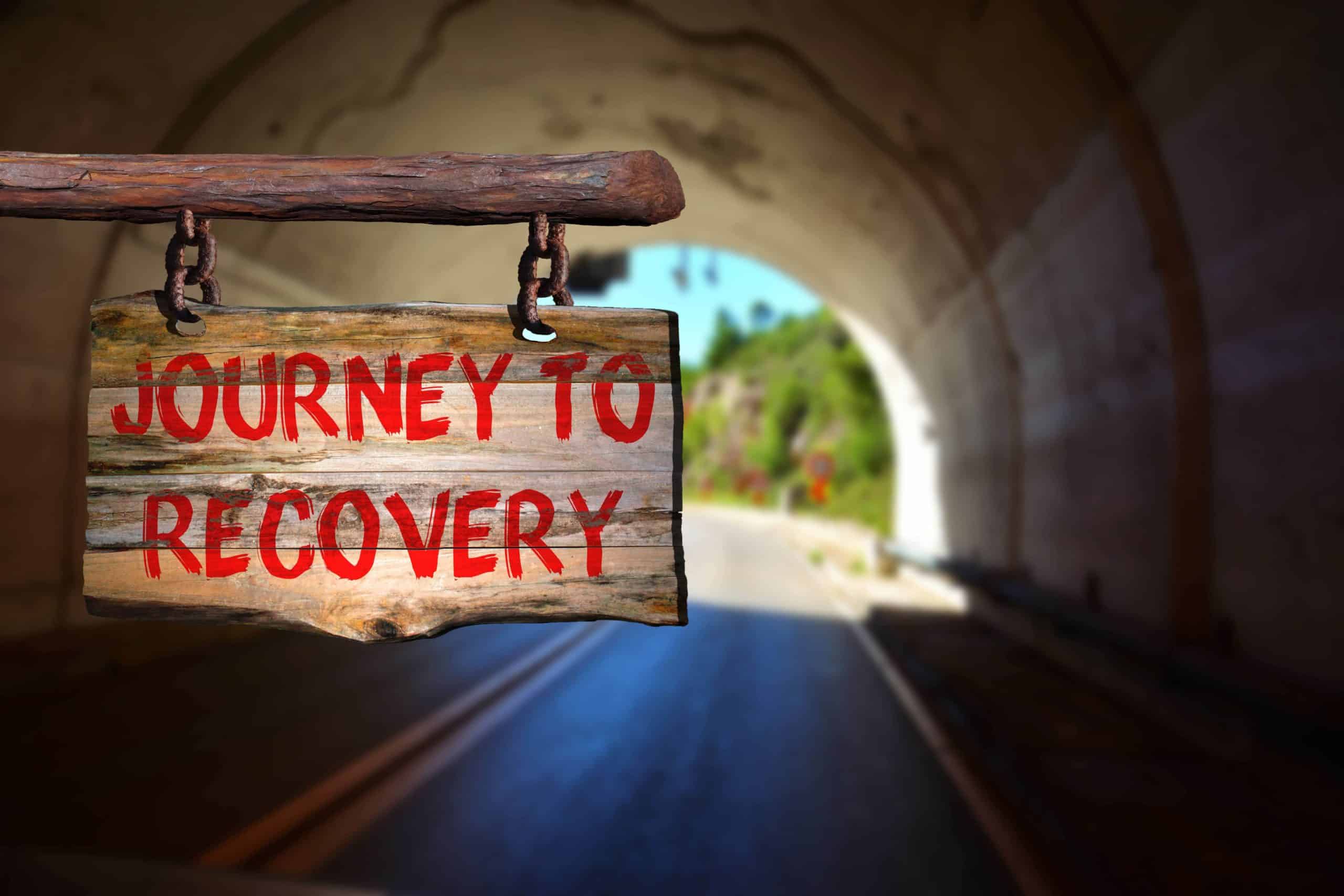 road to addiction recovery sign