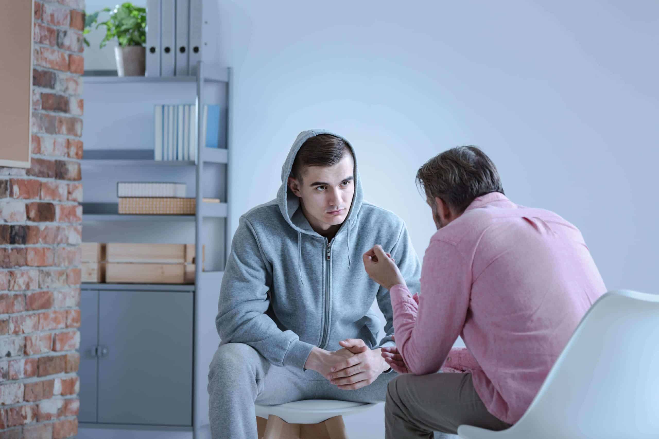 man in behavioral therapy for addiction